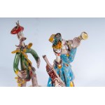 GIOVANNI DE SIMONE (Palermo, 1930 - Palermo, 1991) Lot of three stylised military figures in polychrome ceramic: