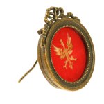 Eagle in brass frame early 20th century. (154)