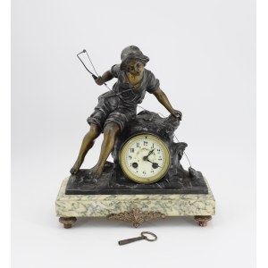 Clock with a boy fishing