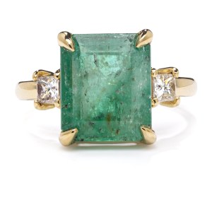 Ring with emerald and diamonds early 21st century.