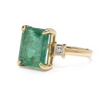 Ring with emerald and diamonds early 21st century.