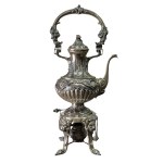 Antique decorative samovar in silver-plated metal