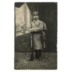 Soldier with rifle, circa 1918. (979)