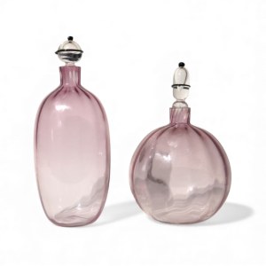 Pair of violet glass table bottles