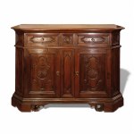 Seventeenth-century style sideboard in carved walnut with dark patina