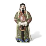 Oriental figure in polychrome porcelain