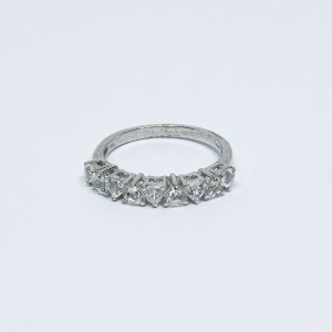 Silver ring with white Topazes in the form of hearts