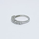 Silver ring with white Topazes in the form of hearts