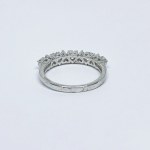 Silver ring with white Topazes in the form of hearts