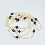 Long necklace of freshwater pearls and enamel balls