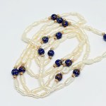 Long necklace of freshwater pearls and enamel balls