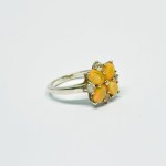 Silver ring in the form of a flower with Opals and white Sapphires