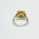 Silver ring in the form of a flower with Opals and white Sapphires