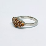 Silver ring with natural orange sapphires