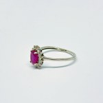 Silver ring with natural Ruby and white Topazes