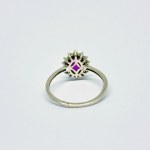 Silver ring with natural Ruby and white Topazes