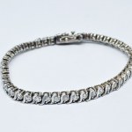 Silver bracelet with white zircons