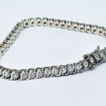 Silver bracelet with white zircons