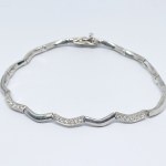 Silver bracelet with white zircons