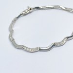 Silver bracelet with white zircons
