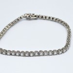 Silver bracelet with white zircons