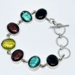 Silver bracelet with colored stones