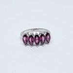 Silver ring with garnets