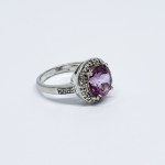 Silver ring with large pink and white topazes