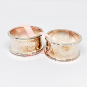 Two silver-plated napkin holders