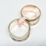 Two silver-plated napkin holders