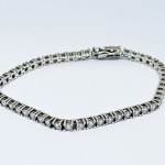Silver bracelet with white zircons
