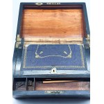 Victorian locking travel desk with two inkwells and a pen