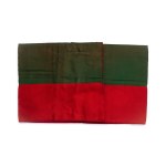 Green and red shoulder band with scout lily