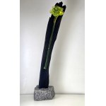 Decorative form - Uranium glass rose on a background of black oak