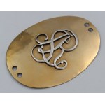 A badge, known as a banderol, featuring the SAR monogram