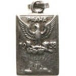 Unsigned. - Prague, 1938. - Perched falcon on a lime branch, view of Hradčany - Ag, 10,5 x 18,5 mm, 1,86 g, one-sided miniature with original eyelet and ring.