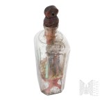 Poland/Curland 18th/19th century. Scene of crucifixion placed in a bottle