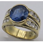 Jewellery - Yellow gold and diamond ring ct.0.60,sapphire ct.6.8...