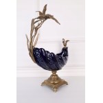 Platter with flying bird in porcelain and bronze