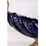 Platter with flying bird in porcelain and bronze