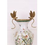 Porcelain vase with bronze