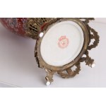 Porelan vase decorated with bronze Amphora