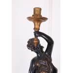 Candle holder with woman motif
