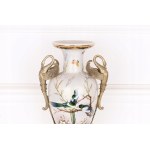 Porcelain vase with bronze bird motif