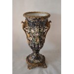 Cup made of dark porcelain wrought with bronze