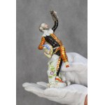 Figure Harlequin with a jug, MIESNIA, Johann Joachim Kandler, early 20th century.