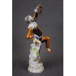 Figure Harlequin with a jug, MIESNIA, Johann Joachim Kandler, early 20th century.