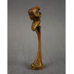 Art Nouveau stamp piston, bronze, circa 1900.