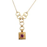 Gold plated vinatge necklace with striking envelope pendant with colored zirconia