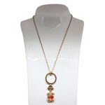 Gold-plated vintage pendant with striking finish and faceted zirconia
